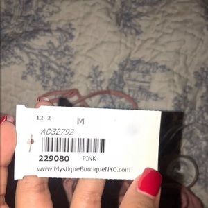 New blush tone ruffle dress from mystique boutique